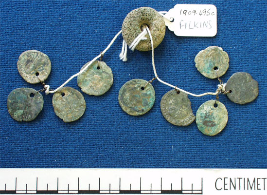 String of coins (AN1909.495c)